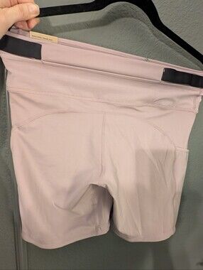 NWT light pink Nike Epic Luxe shorts with a side zippered pocket
